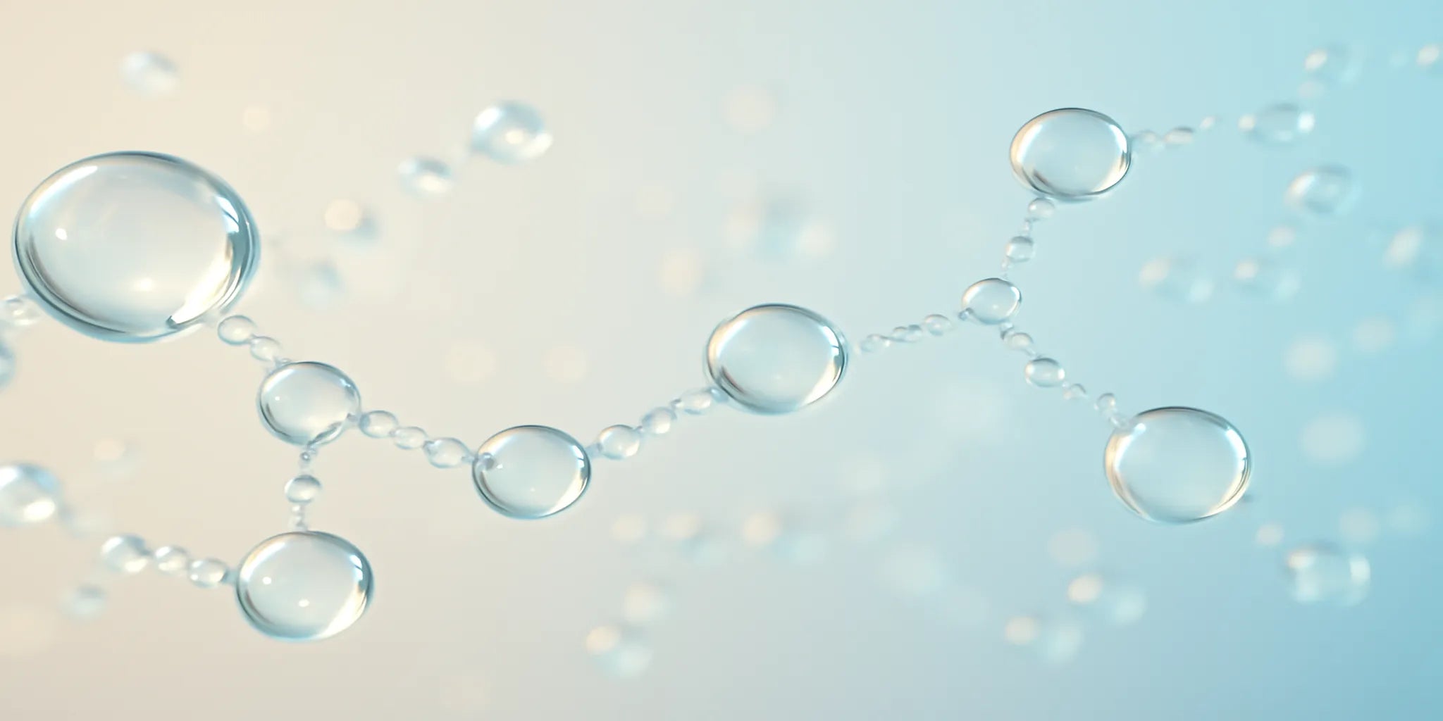 Molekuli kolagena prikazani kroz vodenu strukturu – vizuelni prikaz male molekulske mase i čistoće Premier Collagen peptida u pastelno bež i svetloplavim tonovima.